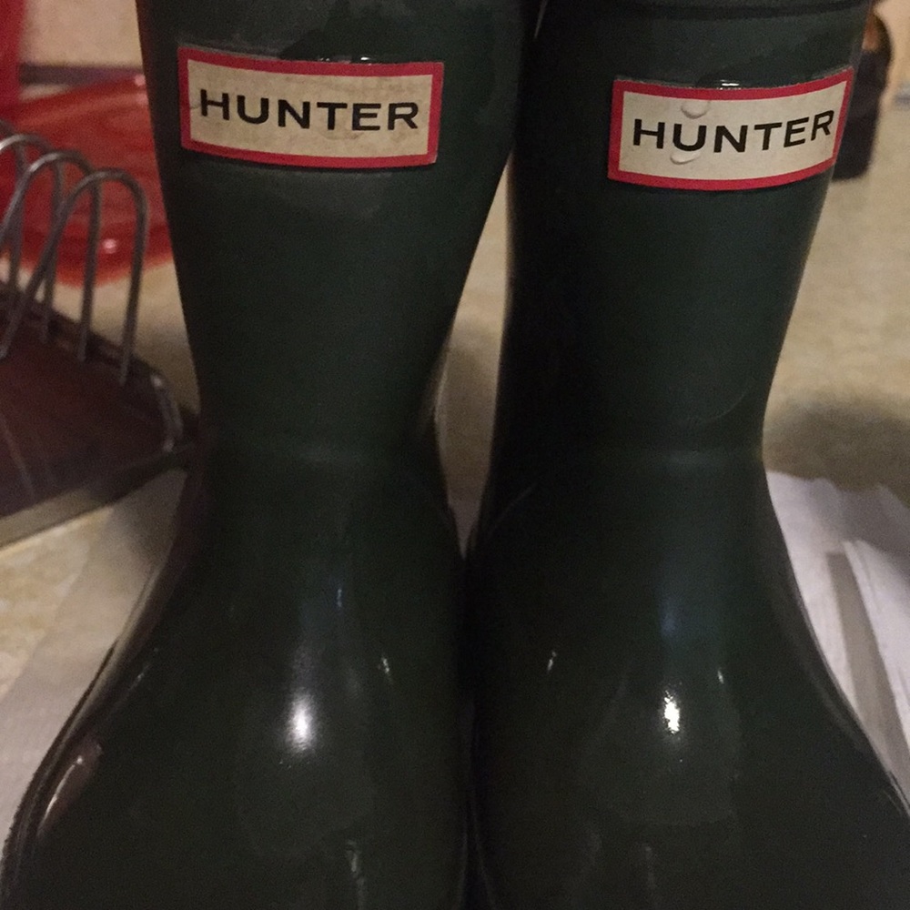 Green hunter boots for children size 5.